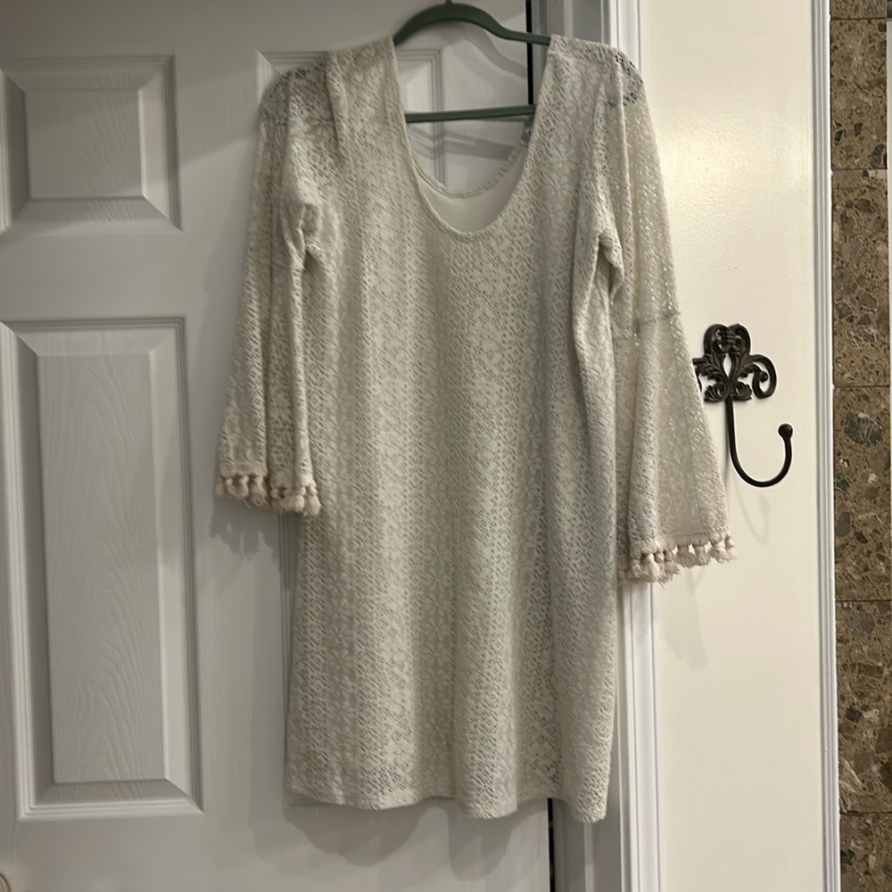 Ivory dress lined with bell sleeves